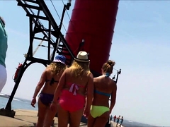 Beach voyeur follows gorgeous young babes in sexy bikinis
