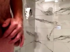 Soft cock and balls stroking in hotel bathroom