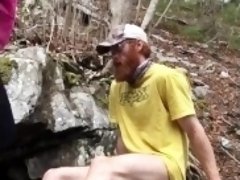 Hiking outdoors first time pissing on cock