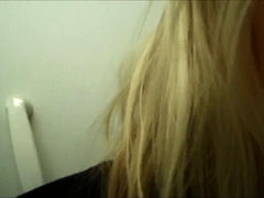 Sensual blonde milf makes herself cum in the dressing room