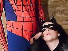 Catwoman blows Spiderman and rides his dick
