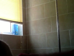 Amateur teen steps out of the shower and reveals her body